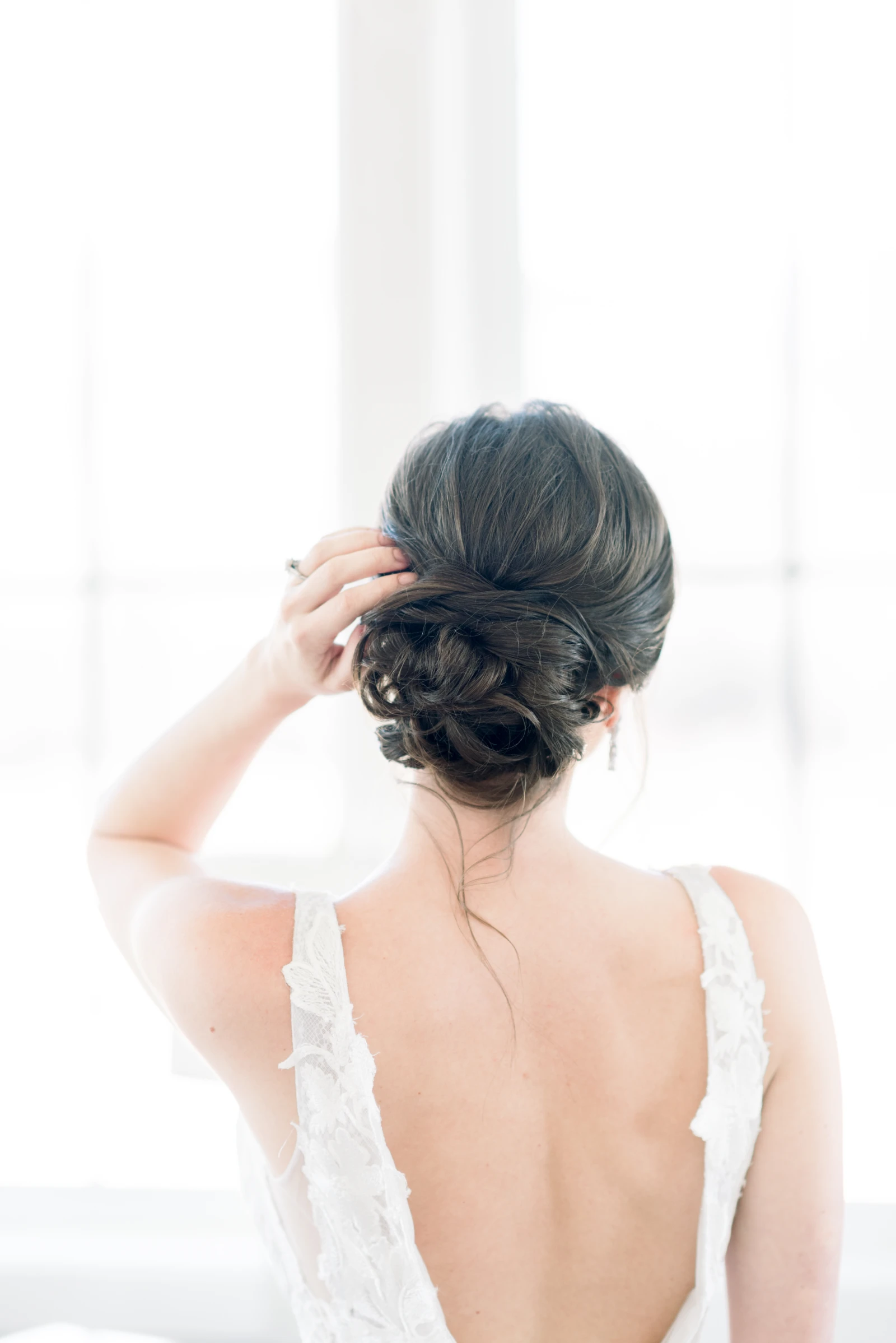 bride standing in sand